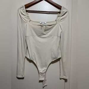 Cloud Ten Long Sleeve Cream Bodysuit